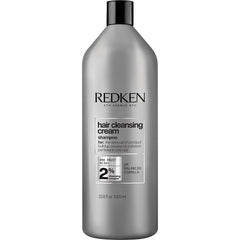 Redken bottle front label showing product name and size for clear identification and trust