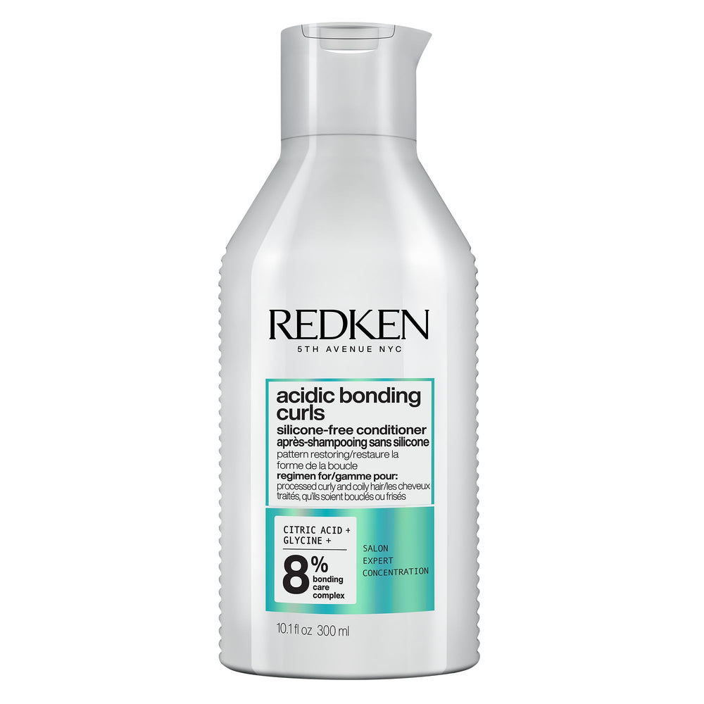 Redken front bottle acidic bonding curls conditioner shows product clarity and benefit