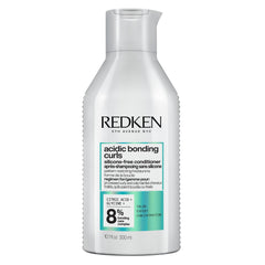 Redken front bottle acidic bonding curls conditioner shows product clarity and benefit