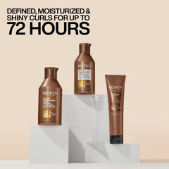 Redken shampoo in hand on wet curls showing gentle cleansing effect