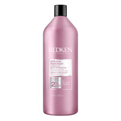 Redken front packaging showing 33.8 fl oz bottle and product benefits