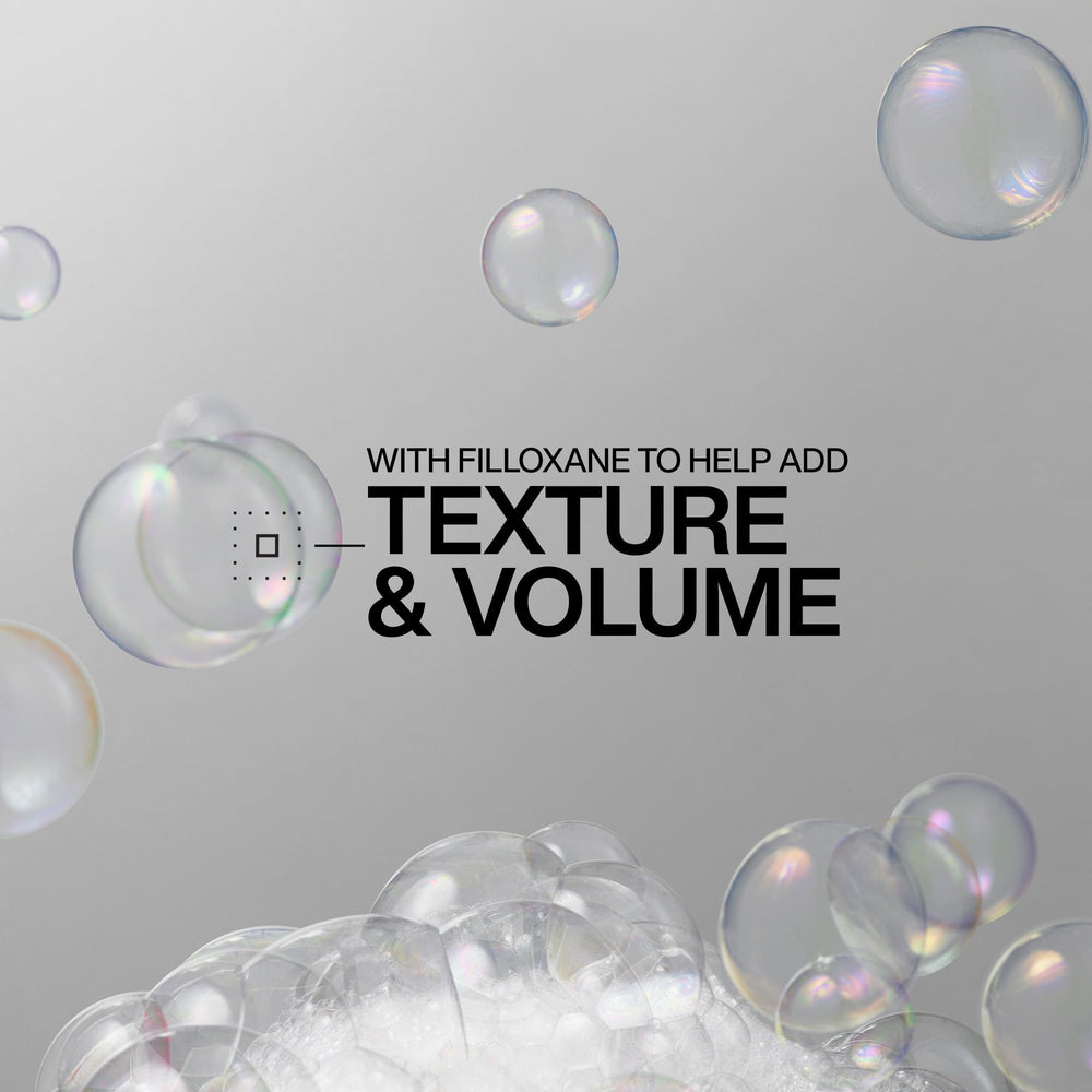 Redken shampoo lather texture demonstrating lightweight foaming action