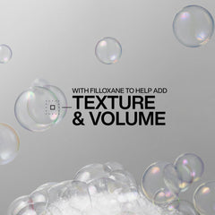 Redken shampoo lather texture demonstrating lightweight foaming action