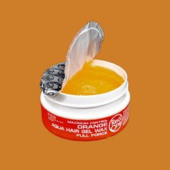 Redone open jar texture of orange gel-wax showing smooth, non-sticky creaminess