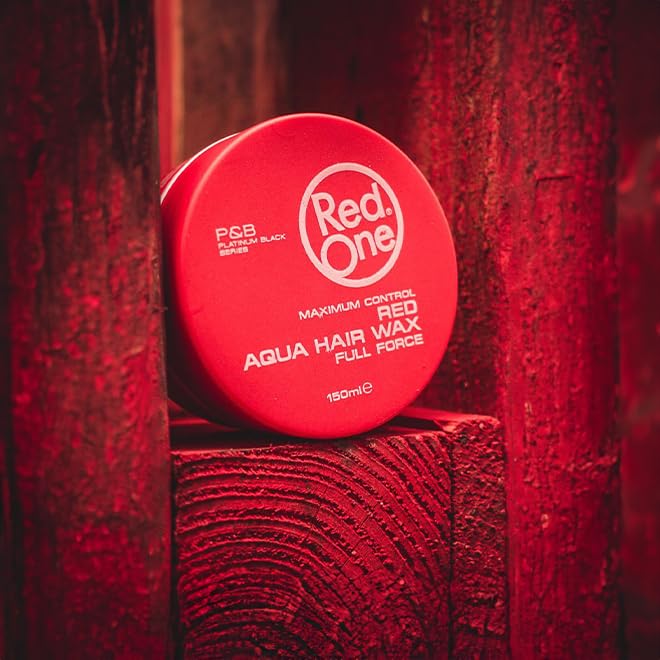 Redone Red One beside ruler showing 150ml scale for size and travel convenience