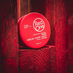 Redone Red One beside ruler showing 150ml scale for size and travel convenience
