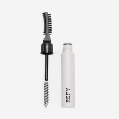 REFY tub in hand to show compact 0.28 oz size for travel convenience