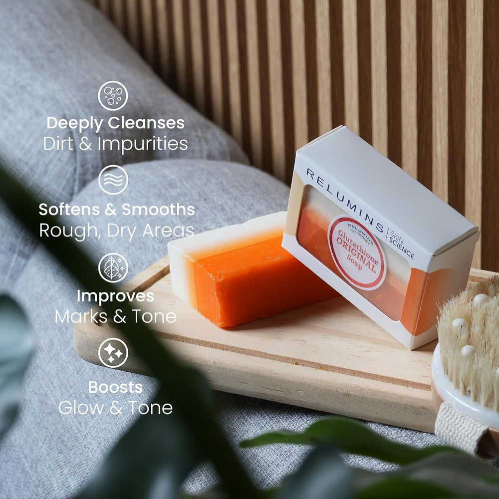 Relumins soap next to hand for clear size and scale reference