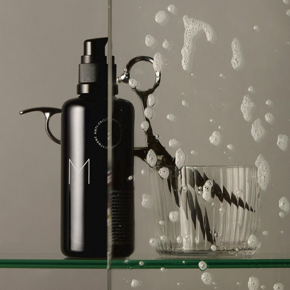 REVERIE on a bathroom shelf in a lifestyle scene suggesting daily use