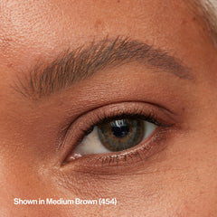 Revlon ColorStay pencil held in hand showing travel-friendly size benefit