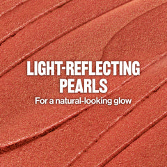 Breaking the surface of Revlon Glimmer Super Balm to activate creamy pigment