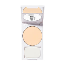Revlon powder applied on cheek demonstrating blurred pores and natural glow