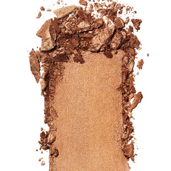 Revlon Skinlights bronzer open pan close-up of silky texture highlighting prismatic pigments