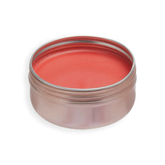 Revolution Balm Glow on model cheeks demonstrating Peach Bliss dewy natural flush