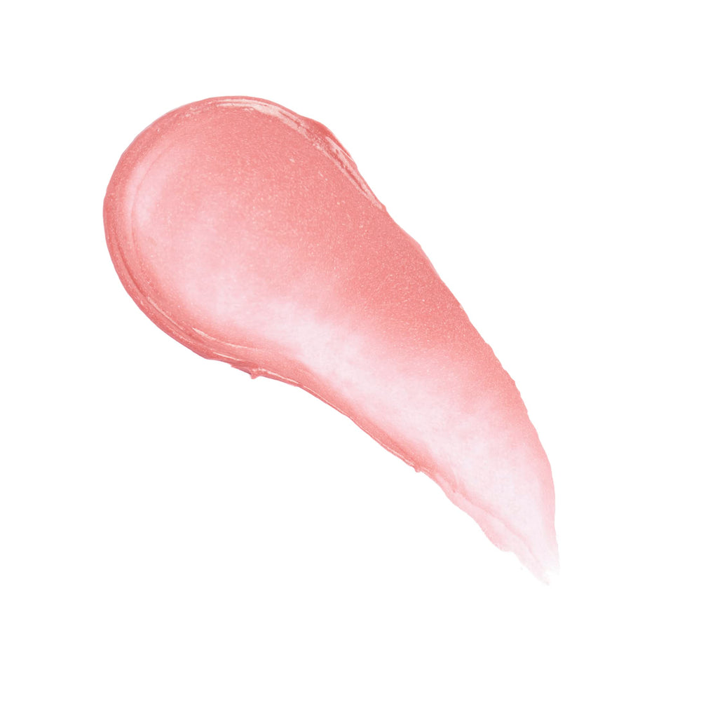 Revolution Balm Glow texture swipe of Peach Bliss showing creamy finish and blendability
