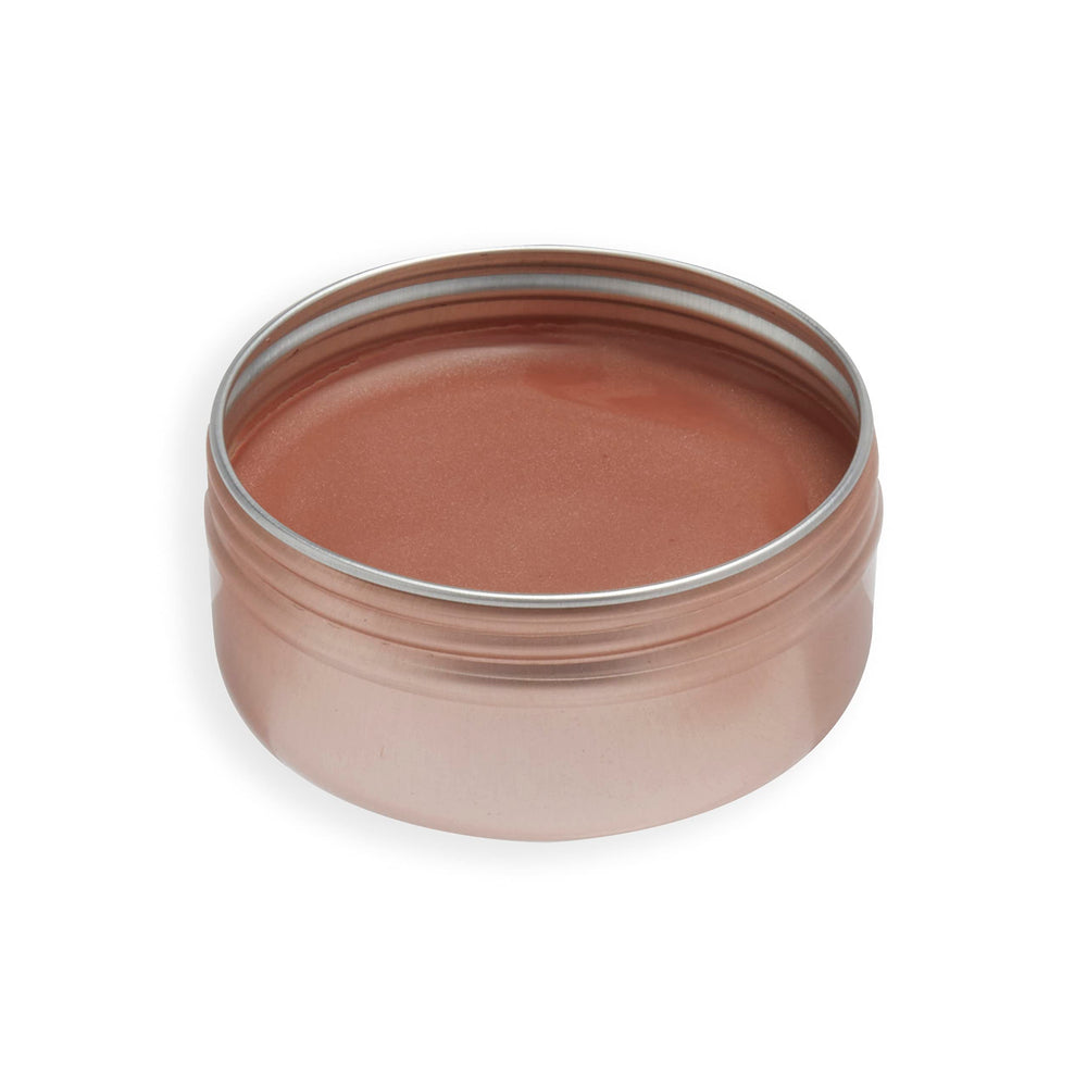 Revolution Balm Glow applied on cheeks demonstrating natural dewy flush and glow
