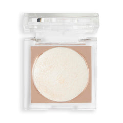 Revolution Beauty compact beside coin to show compact size and portability benefit