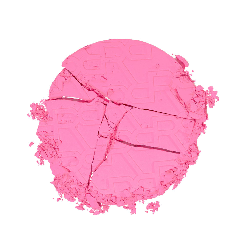 Revolution powder close-up texture highlighting smooth talc-free finish benefit