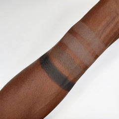 Revolution Brow powder close-up texture displaying smooth pigment for natural finish
