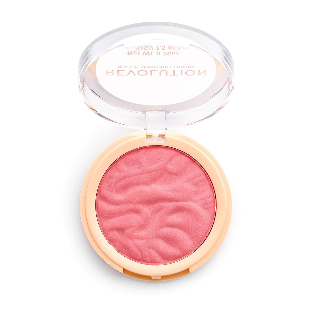 Revolution Beauty London open compact with brush demonstrating quick application