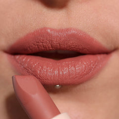 Revolution Beauty London model wearing Wifey dusky pink showcasing wearable everyday satin finish