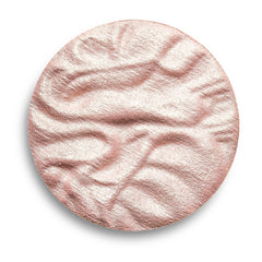 Revolution Beauty London highlighter styled in makeup bag for everyday carry and quick touch-ups