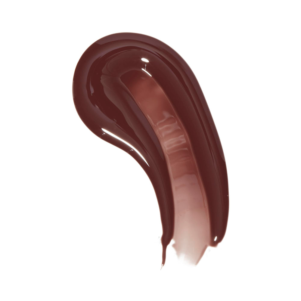 Revolution Pout Bomb XXL doe-foot applicator ready to apply for even coverage