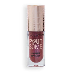 Revolution Pout Bomb product beside ingredient label highlighting hyaluronic acid and vegan formula