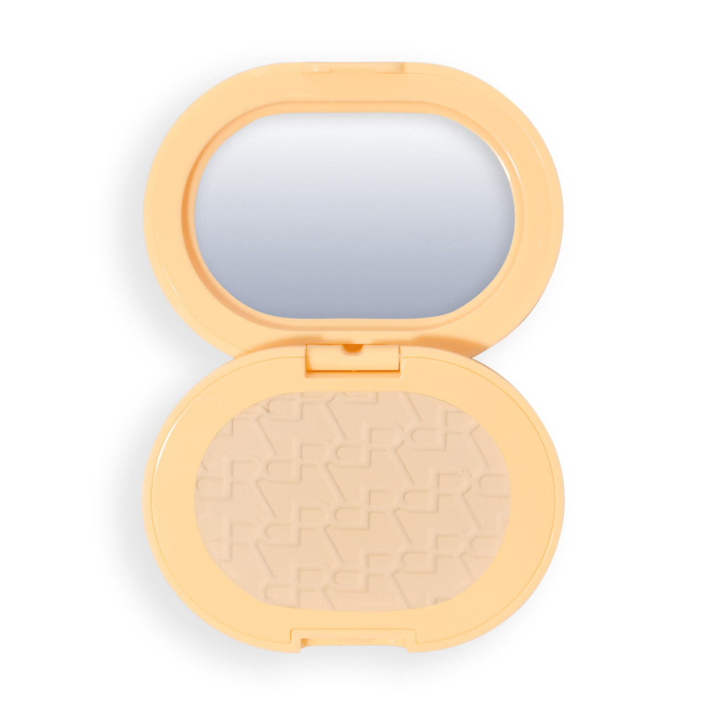 Revolution compact front showing Banana Light shade and portable benefit