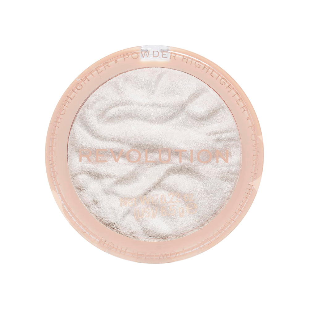 Revolution Beauty London compact next to coin showing travel-friendly size