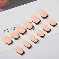 RikView close-up of black French tip detail highlighting salon-quality finish
