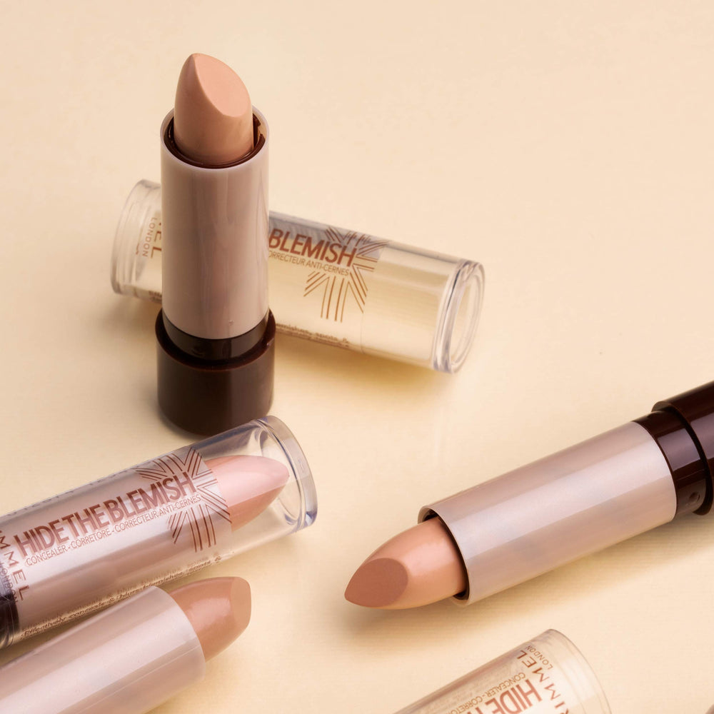 Rimmel concealer being tapped under eye for brighter, natural-looking results