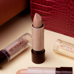 Rimmel concealer held in hand to demonstrate the compact travel-friendly size