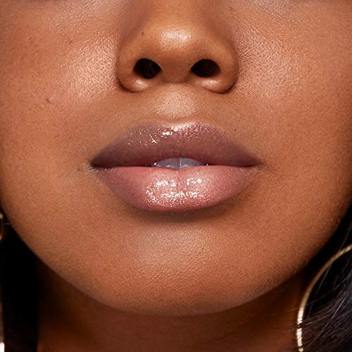 Rimmel lifestyle model wearing Seduce Me gloss showing natural-looking shine