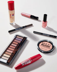 Rimmel on model wearing bold evening look with transfer-resistant benefit