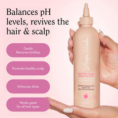 Rizos Curls 2.5 oz bottle beside a passport showing travel-friendly size and easy packing