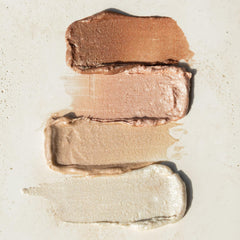 RMS Beauty luminizer inside makeup bag ready for touch-up benefit
