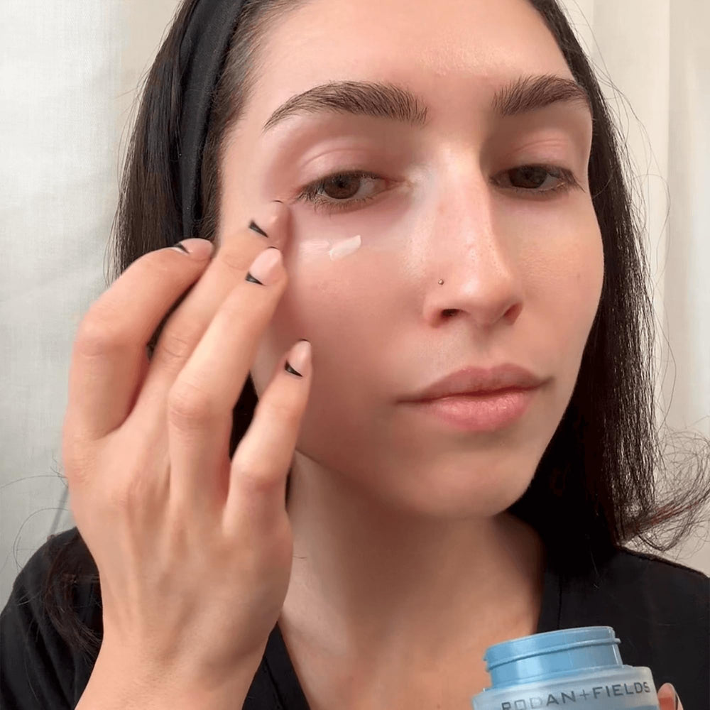 Rodan + Fields 15 ml tube next to a coin to show compact travel size