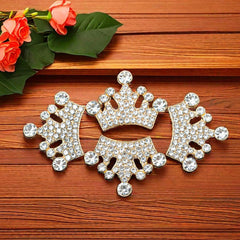 Rodvanvo crown beside ruler showing 25x32mm size for scale and planning