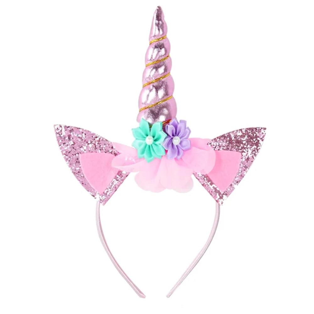 Roffiy headband front view showing pink horn and flowers, adds playful sparkle