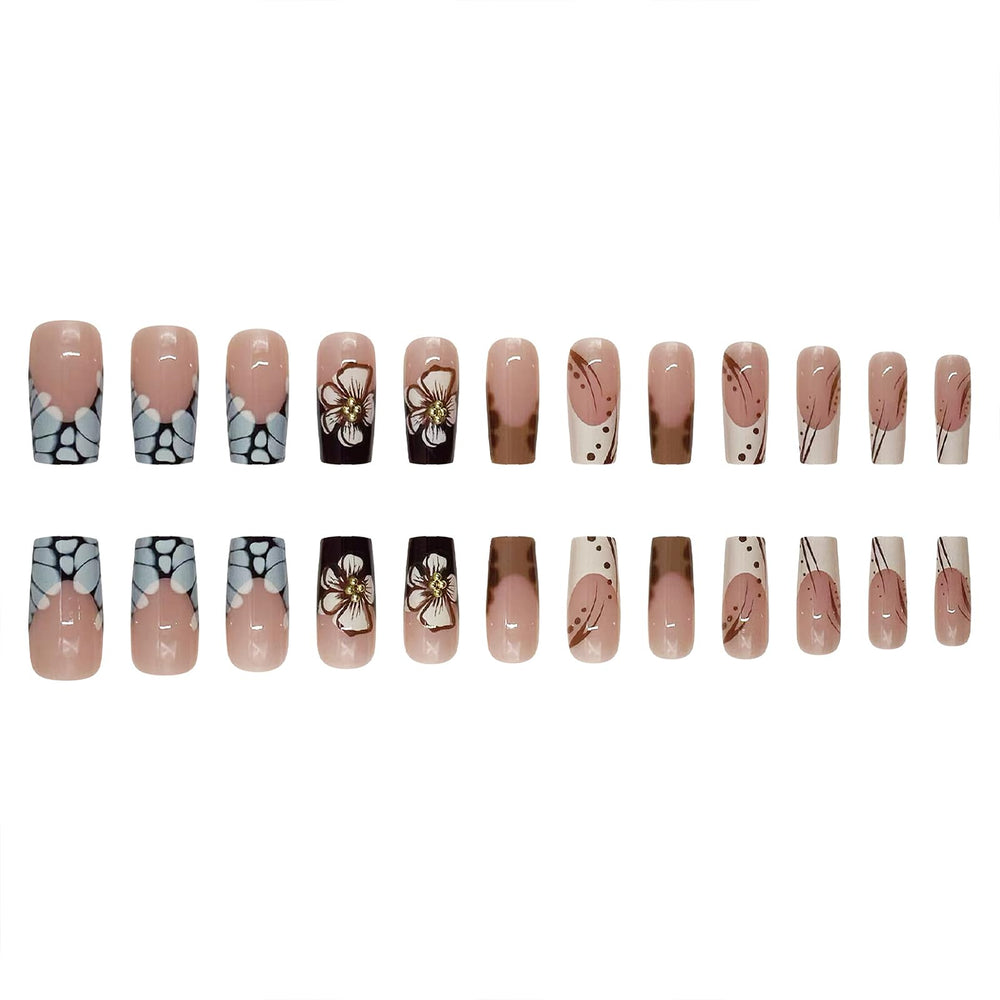 ROFIBUT nails held in hand to show scale and medium square length for natural-looking fit