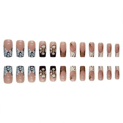 ROFIBUT nails held in hand to show scale and medium square length for natural-looking fit