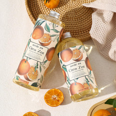 ROMIIE ZOI refill bottle next to a kitchen sink depicting convenient in-use replenishment and fresh scent