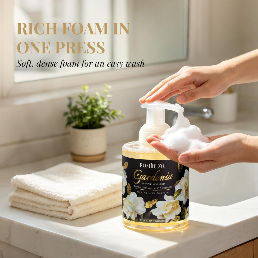 ROMIIE ZOI bottle next to hand showing 500ml size for long-lasting use
