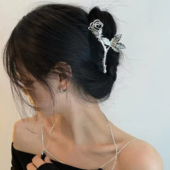 ROMODIYA silver rose on dresser lifestyle shot shows stylish everyday accessory