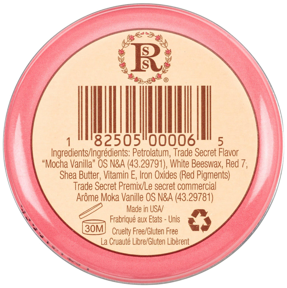 ROSEBUD SALVE fingertip applying balm to lips for targeted hydration benefit