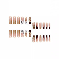 RTKHFZE close-up of French tip with rhinestones highlighting decorative detail