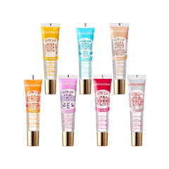 Ruby Kisses front packaging showing seven clear gloss tubes and high-shine benefit