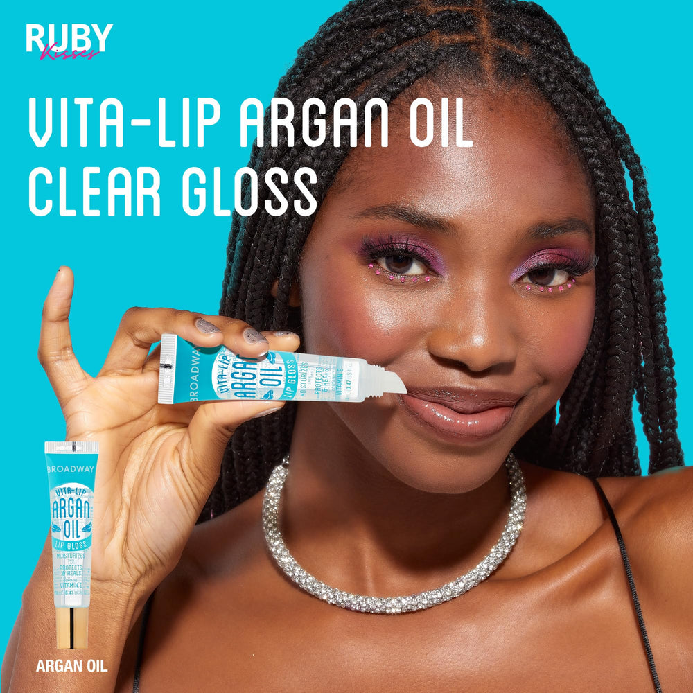 Ruby Kisses glosses in hand showing portable size and daily convenience