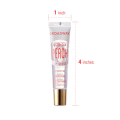 Ruby Kisses gloss applied on lips showing sheer peach shine and moisturized look